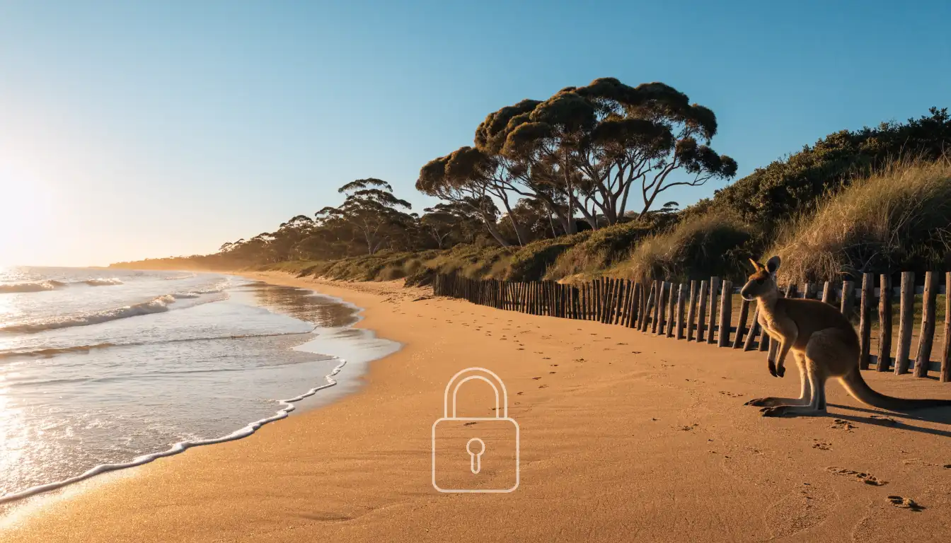 Kangaroo by beach with floating lock symbol at sunrise